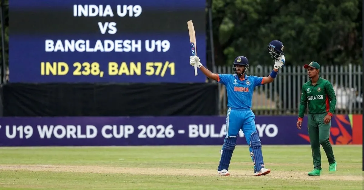India vs Bangladesh U19 World Cup 2026 match in Bulawayo showing an Indian batsman celebrating a half-century with the scoreboard displaying IND 238 and BAN 57/1.